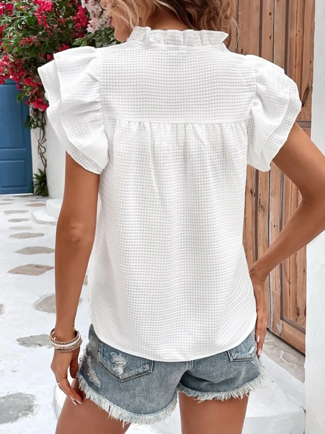 Explore More  Collection - Ruffled Notched Cap Sleeve Blouse