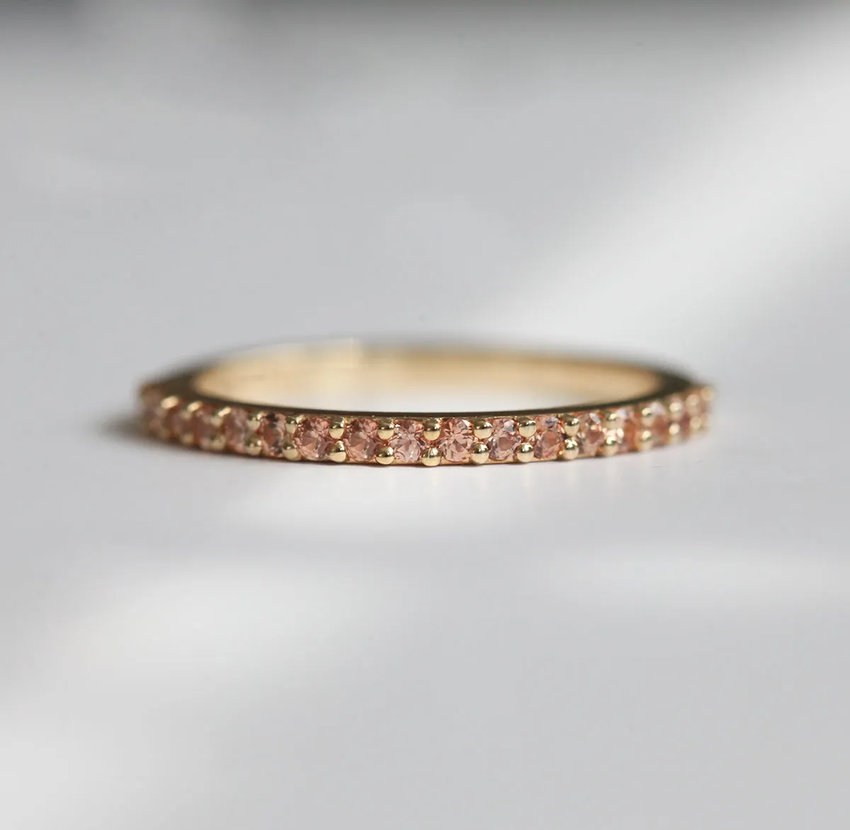 Full Eternity Peach Sapphire Ring