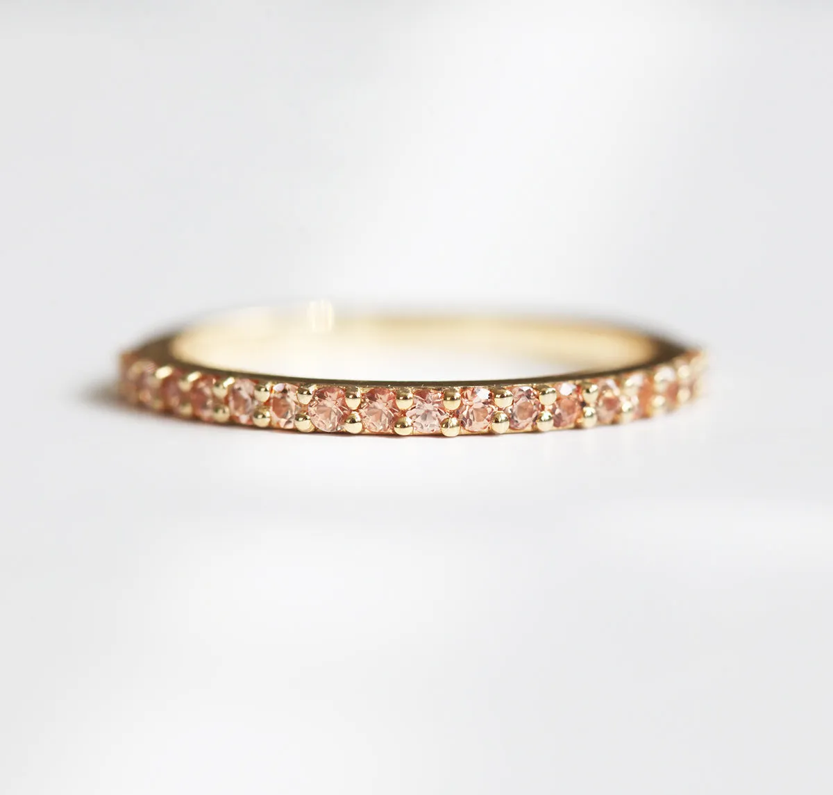 Full Eternity Peach Sapphire Ring