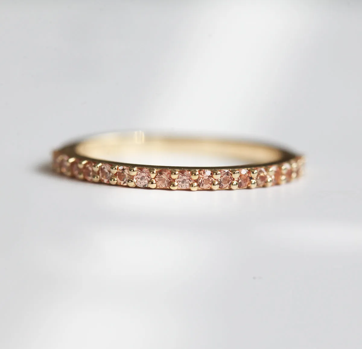 Full Eternity Peach Sapphire Ring