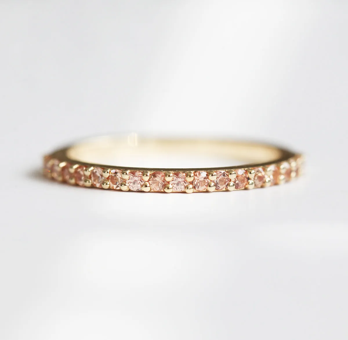 Full Eternity Peach Sapphire Ring