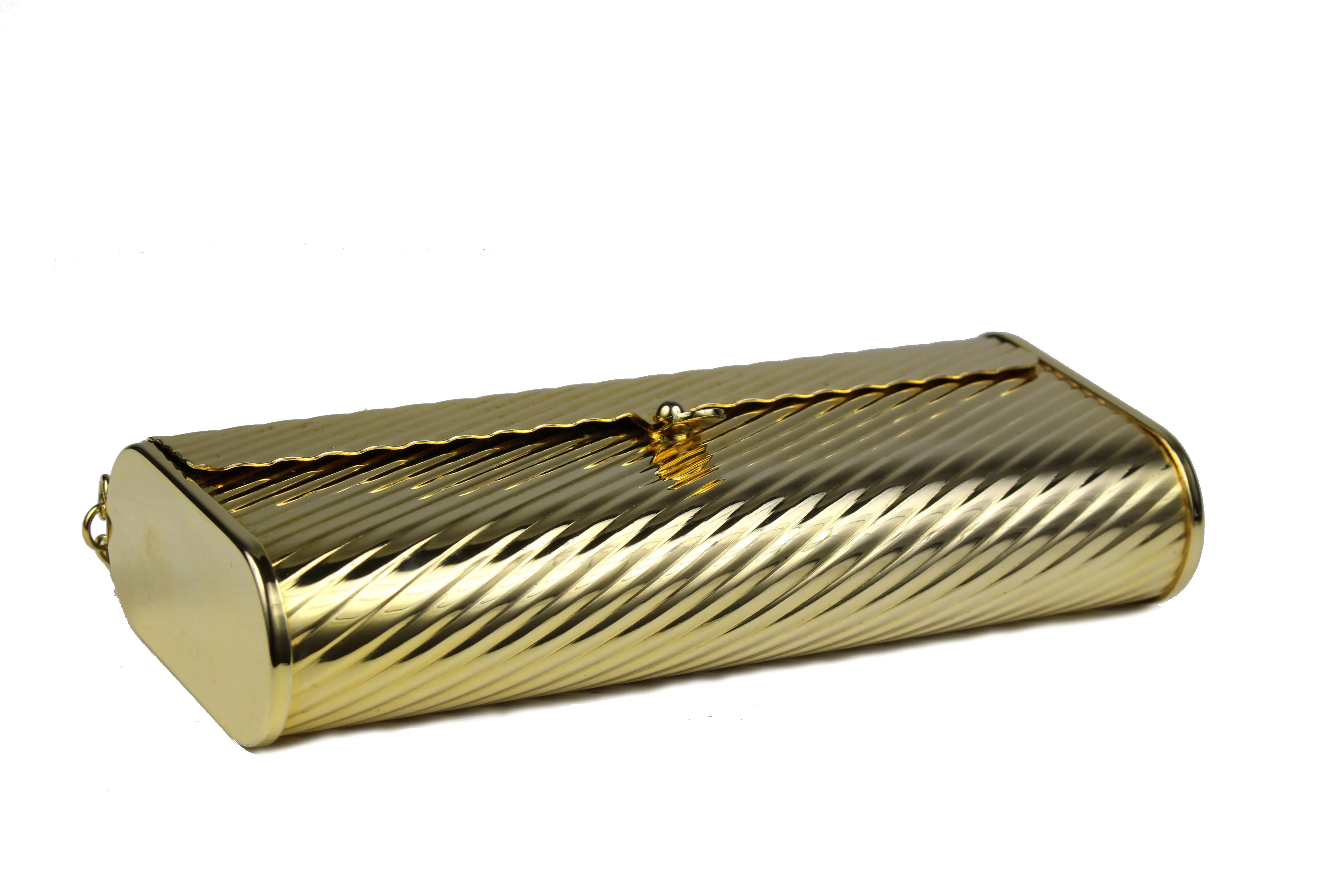 Gold metal flap clutch with diagonal engraving