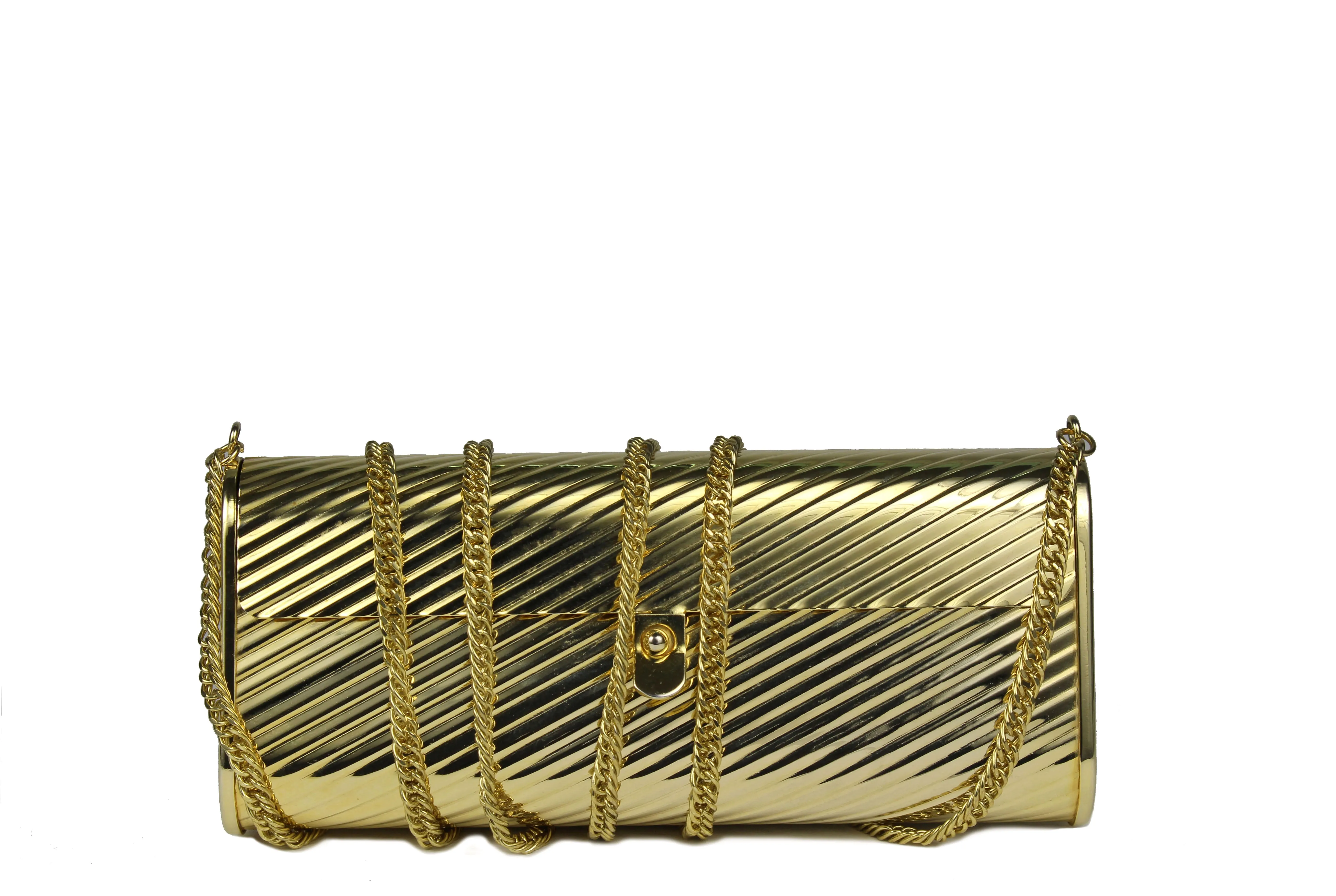 Gold metal flap clutch with diagonal engraving