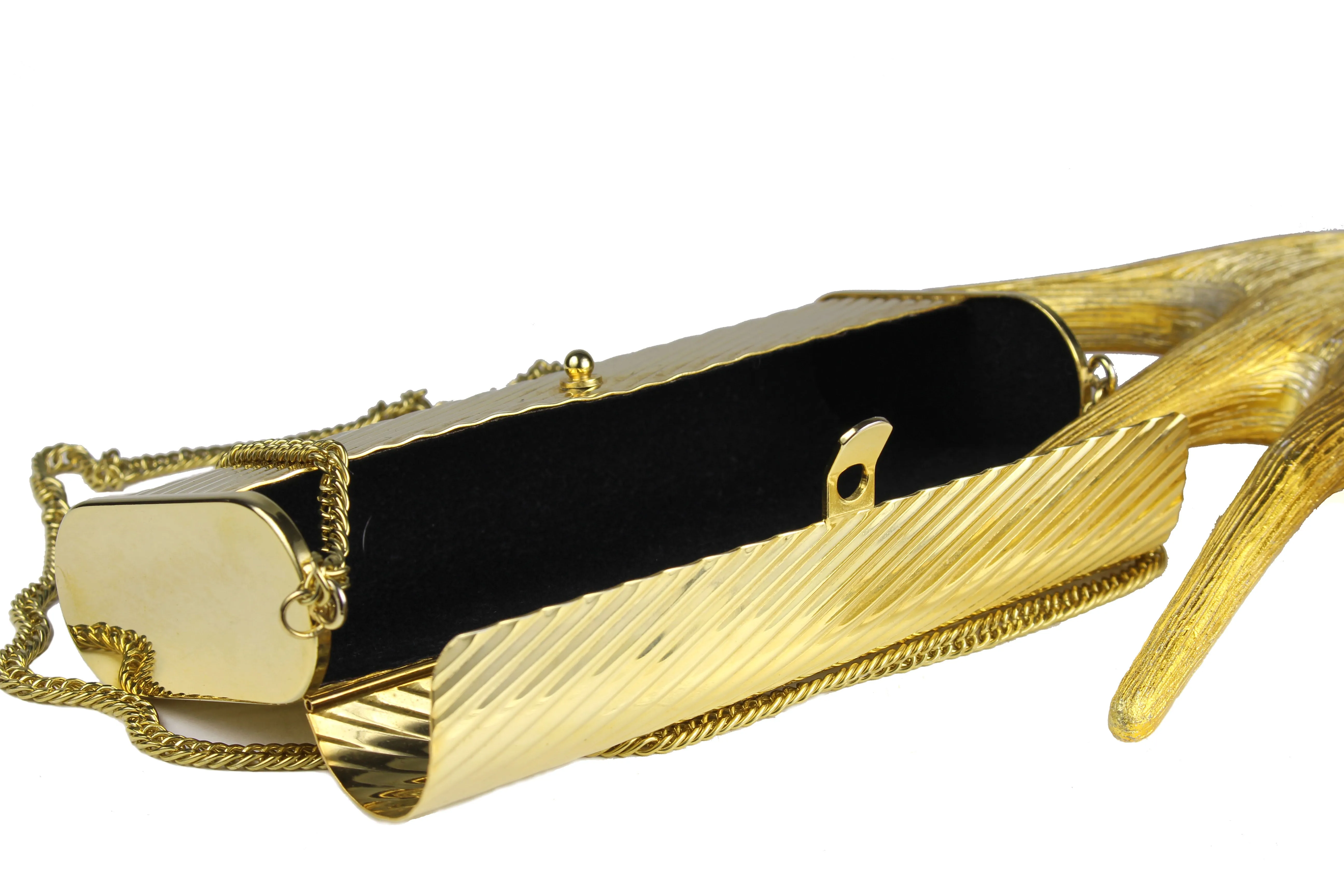 Gold metal flap clutch with diagonal engraving